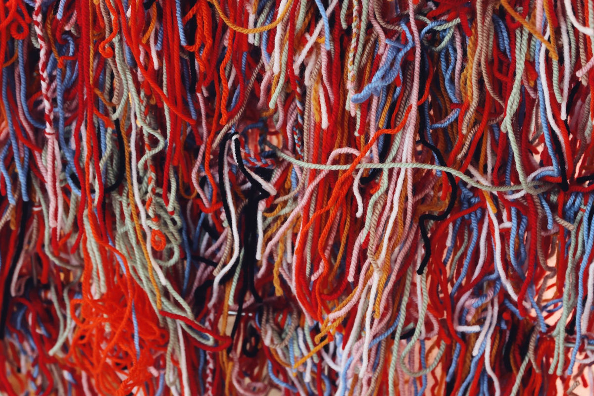 Photo by Efrem  Efre  : https://www.pexels.com/photo/colorful-tangle-of-yarn-threads-from-tokyo-31206822/